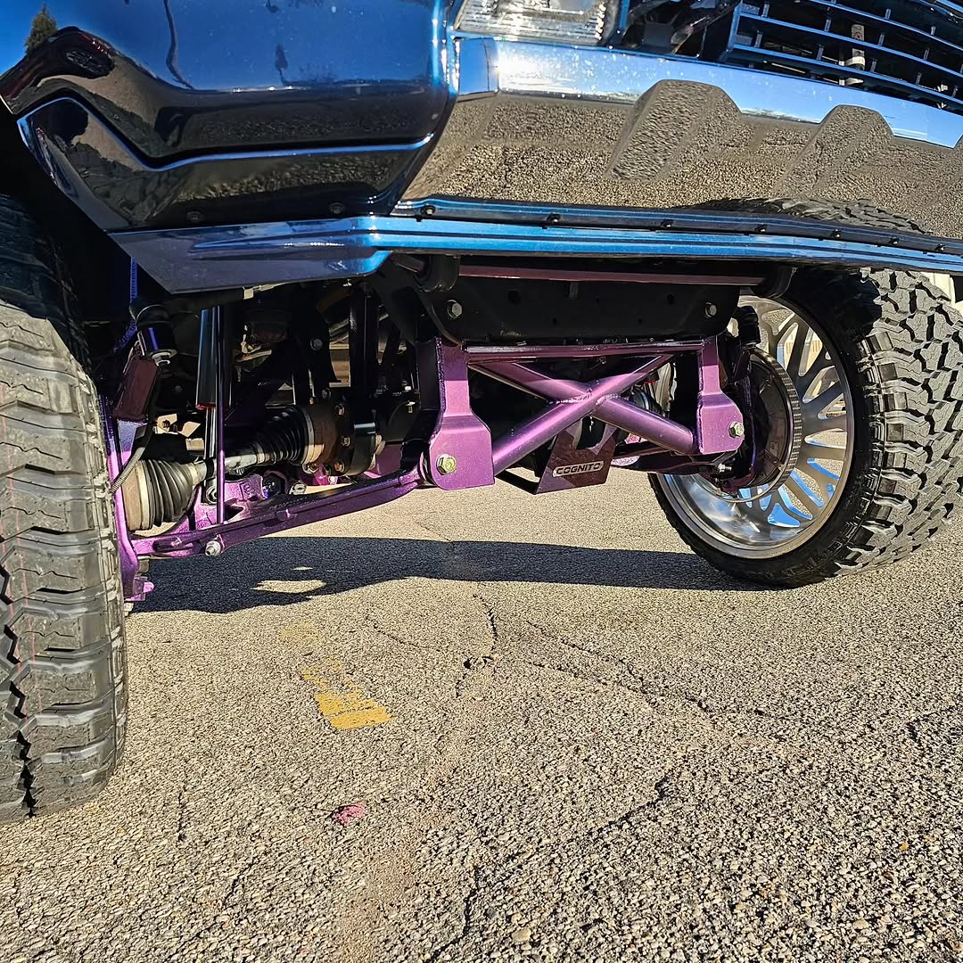 GMC 3500 HD on color-shift purple Cognito suspension